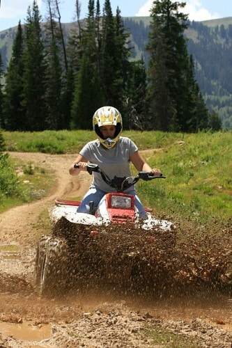 atv going through mud 1