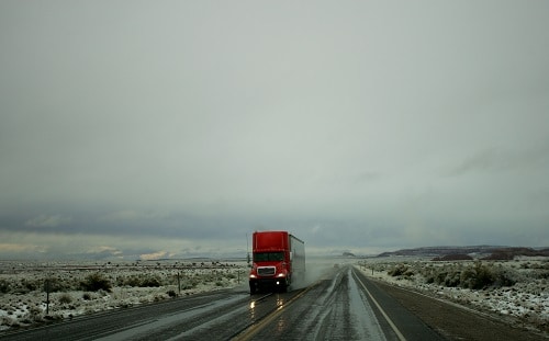 winter wet road semi truck 1