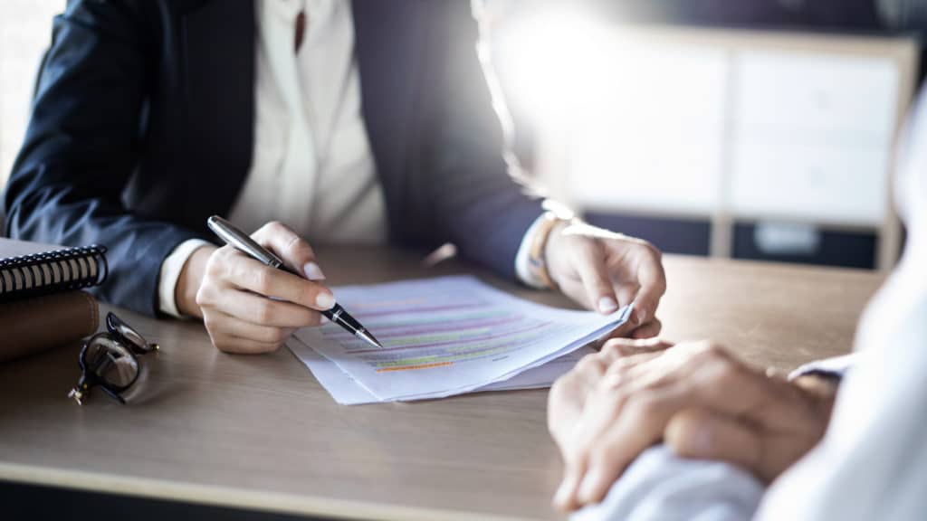 A lawyer having a consultation with a client.