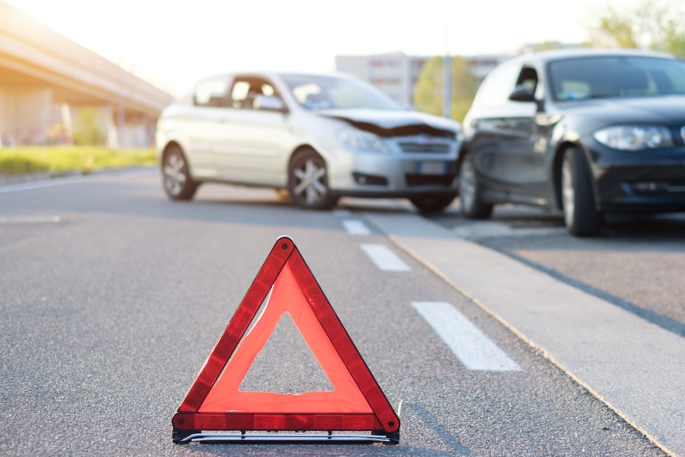 Reflective red triangle to point out a car crash