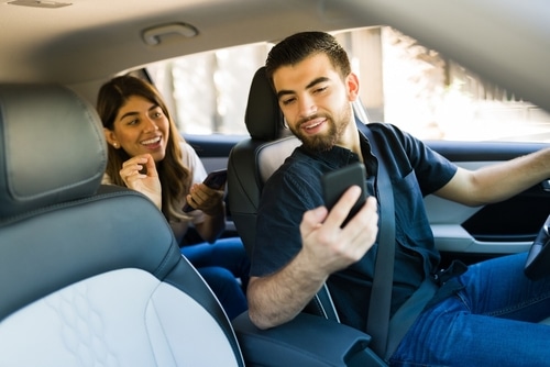 Hispanic driver on a rideshare app