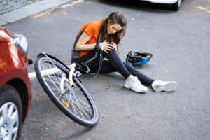 Car And Cyclist Accident And Injury. Bicycle Crash