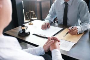 Man meeting with personal injury lawyer in Boulder, CO