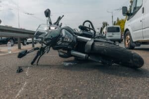 A motorcycle tipped on its side after a motorcycle accident in Colorado