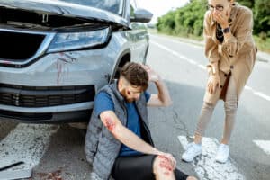 A woman looking shocked after a pedestrian accident in Boulder, CO