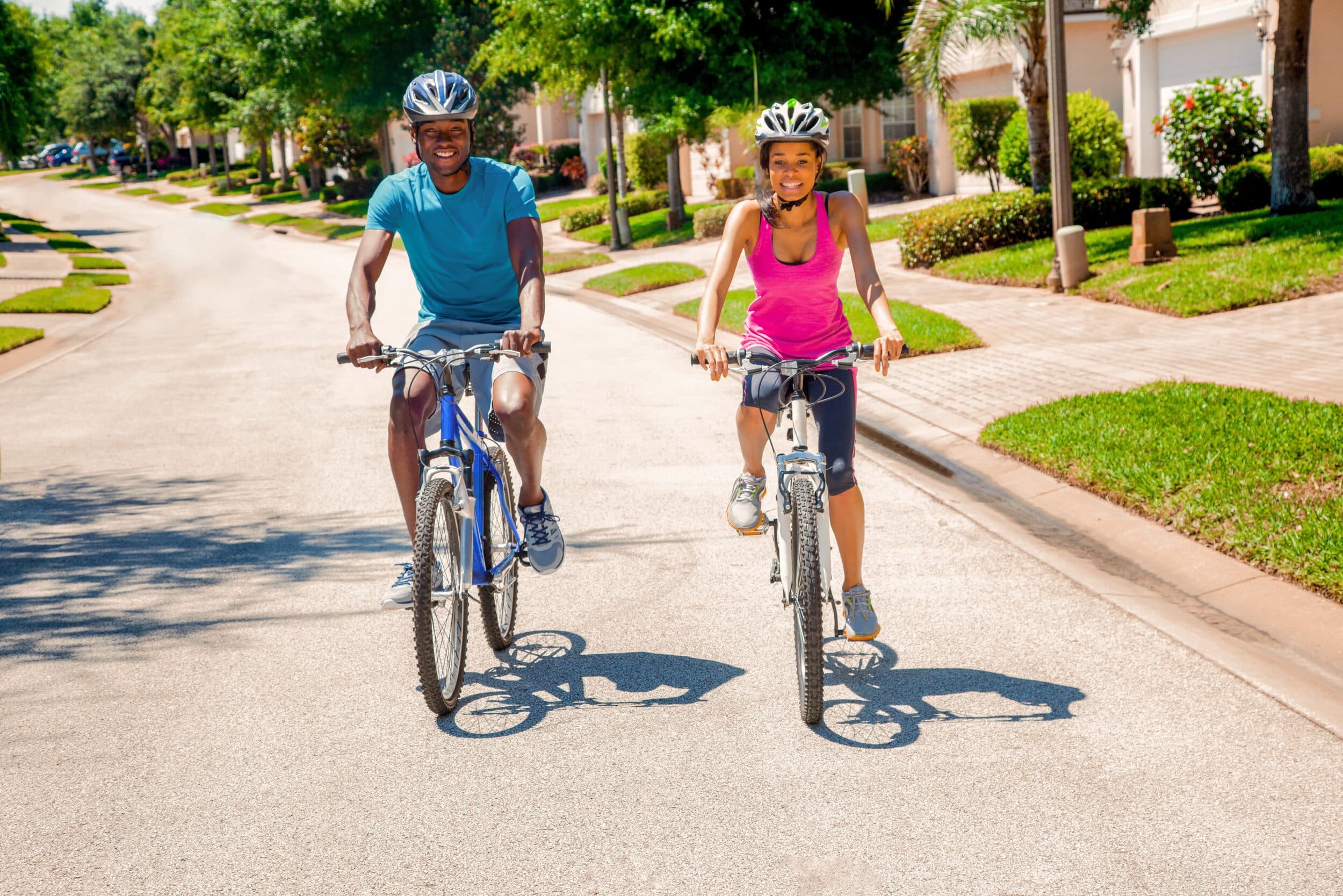 A man and woman riding bicycles in Boulder