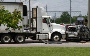 A semi truck and a car after a truck accident in Boulder